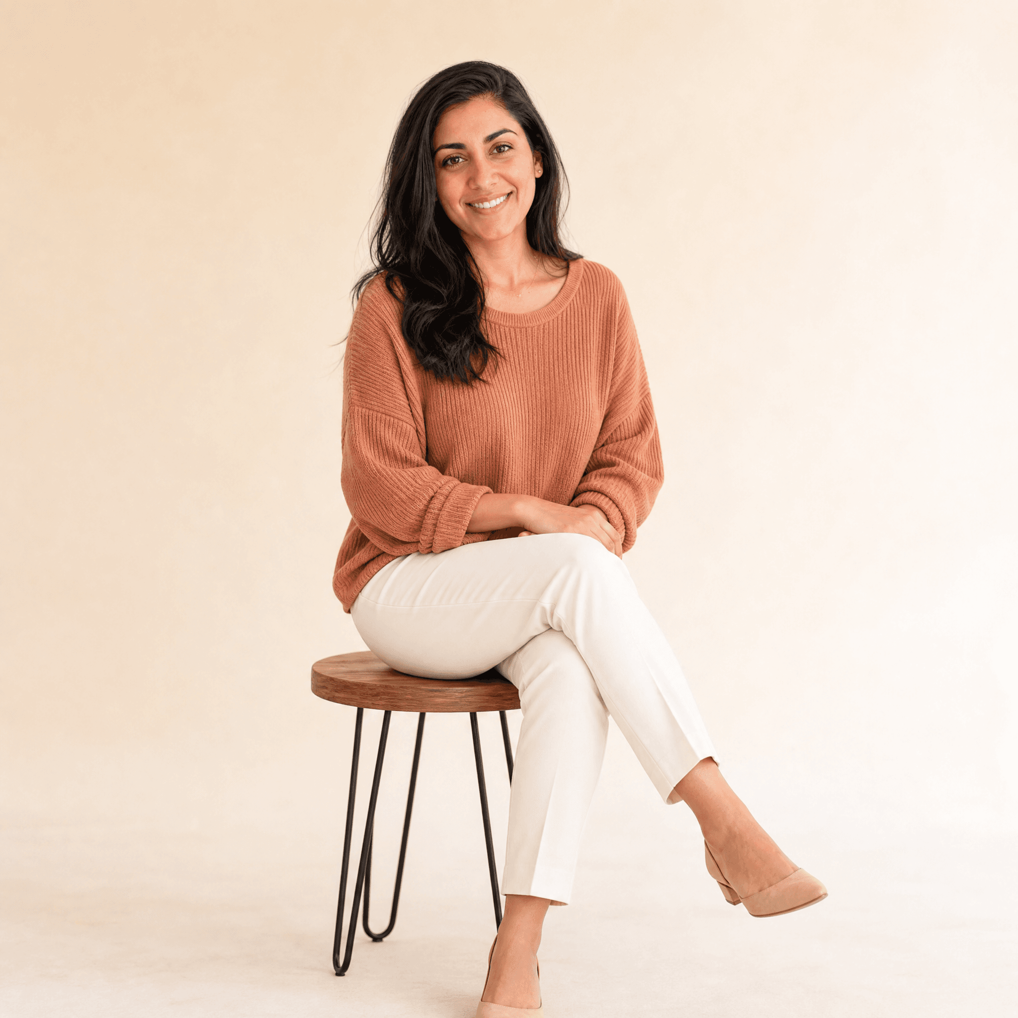 Yusra seated on a stool for In My Cart